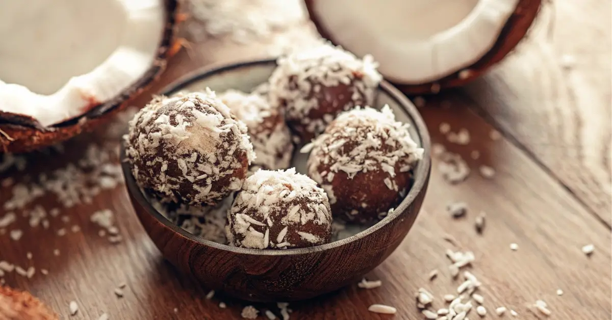 Coconut clusters in bowl with seeds and flakes