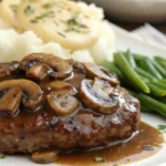 Salisbury steak with brown gravy and mashed potatoes
