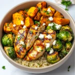 Assembled hot honey chicken bowl with toppings