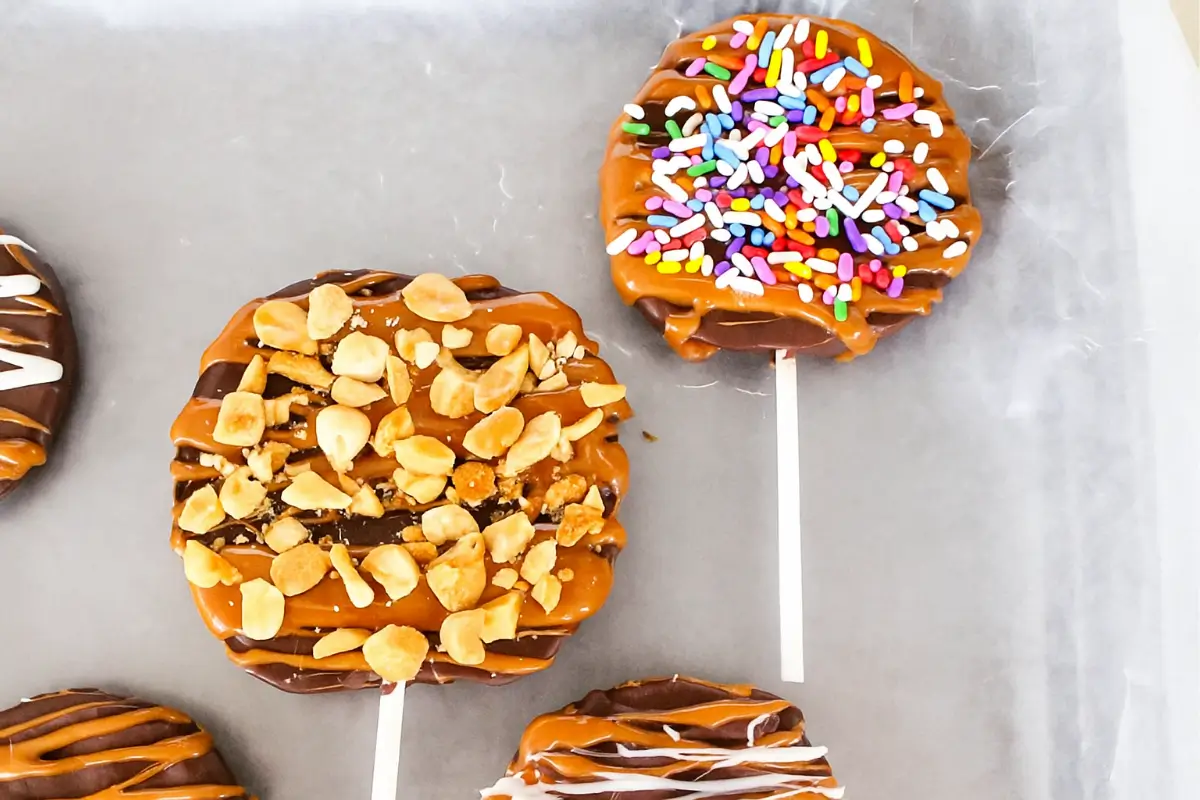 Caramel apple slices on platter with toppings